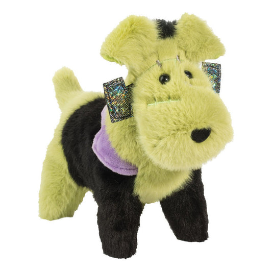Det här är en Frankensteinhund från Douglas Cuddle Toys. Hunden står på fyra ben och har en lång, rufsig päls med svag glans: grönt på huvud, nos, öron, svans och nedre ben, svart på rygg och övre ben, plus en kort svart rand på huvudet och en svart sadelteckning. Öronens insida är grön, ögonen är svarta och runda och nosen är svart med rundad triangelform. Ett lila halvrunt tygstycke sitter vid halsen och glittrande band vid sidorna av huvudet. Uppsynen ser nyfiken ut.