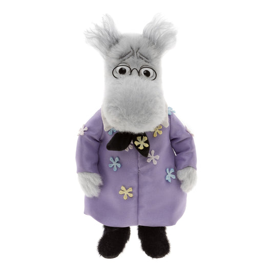 Det här är Minimo Hemulen, ett gosedjur från Charlie Bears. Pälsen är ljusgrå alpackaull, medellång och lite rufsig med tofsar på öronen; benen och fötterna har kort, tät svart päls. Nos, händer och tassar är ljusgrå, öronens insida mörkare. Ögonen är svarta med vit kant bakom små runda svarta glasögon, och någon tydlig nostipp syns inte. Mörka sydda bryn ger en bekymrad min. Han står upprätt och kan sitta eller stå, klädd i dräkt med blommiga detaljer och svart slips.