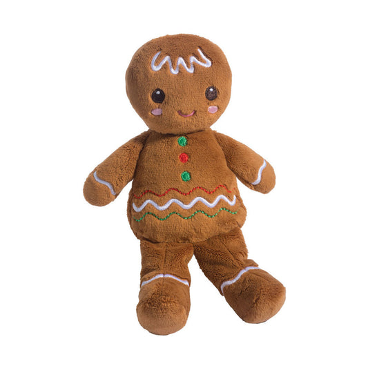 Det här är en pepparkakspojke från Douglas Cuddle Toys. Stående figur med kort, tät och matt brun päls. Runt huvud med vit sicksackglasyr i pannan, stora svarta ögon med vita glansprickar, broderade rosa kinder och liten böjd magentafärgad mun, ingen synlig nos. Korta armar med vita glasyrränder, rund mage med tre broderade knappar i grönt, rött och grönt samt tre rader vågig glasyr. Raka ben med vita ränder ovanför fötterna, upprätt hållning och glad min.