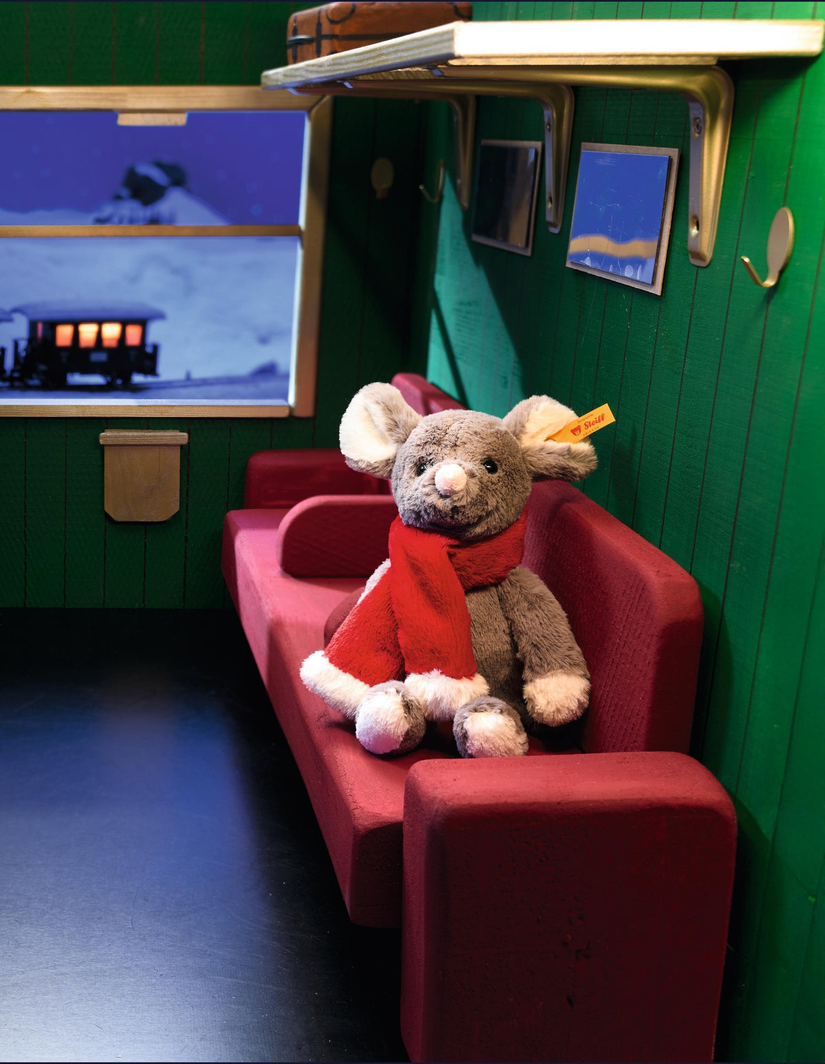Mia in the train compartment